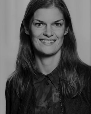 Black and white headshot of Kristina Bakkær Simonsen