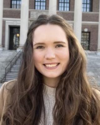 Headshot of Catharina O'Donnell in front of a building