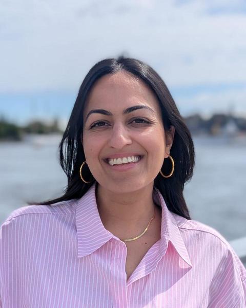 Headshot of Leela Khanna in front of a body of water. 