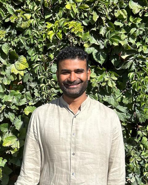Rajkamal Singh Headshot in front of greenery