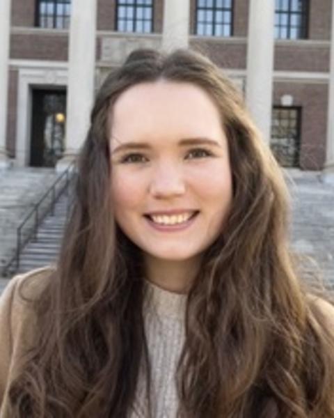 Headshot of Catharina O'Donnell in front of a building