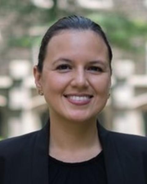 Headshot of Sandra Portocarrero standing outside and smiling