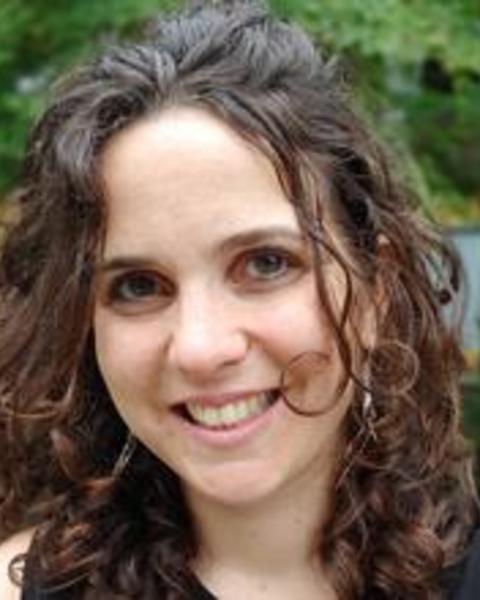 Headshot of Talia Shiff taken outside in front of a tree