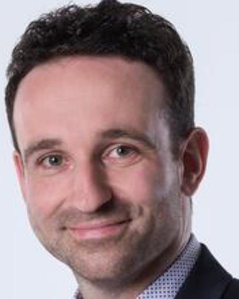 Headshot of Thijs van Dooremalen situated against a light grey background
